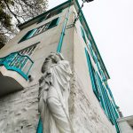 A marble statue of a female outside the Hotel Portmeirion