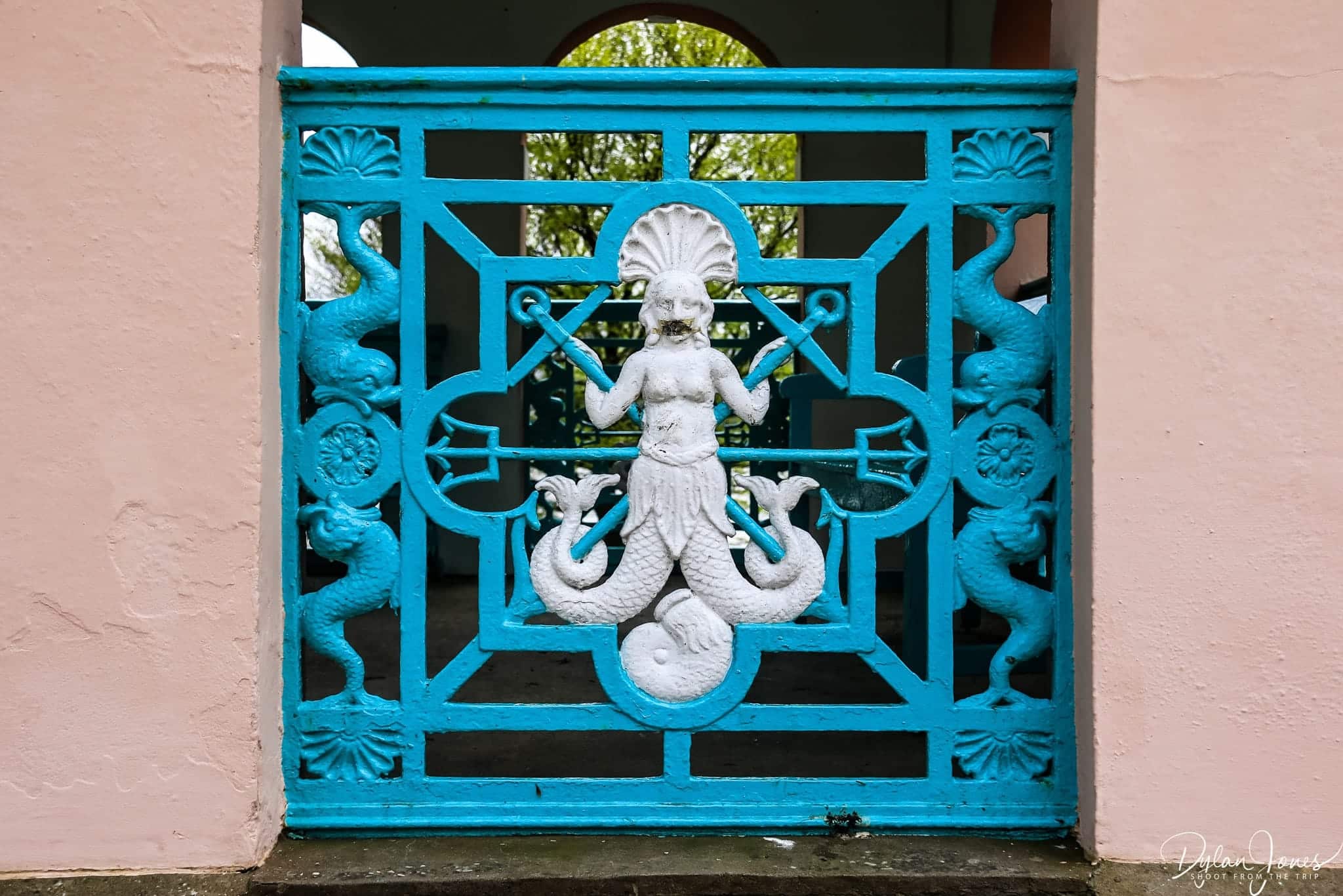 Blue cast iron panels with mermaid detailing at Portmeirion