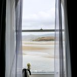 Estuary views from the arched hotel room window