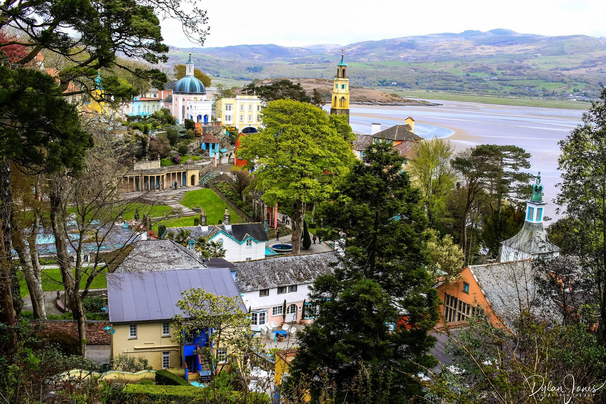 A view of Portmeirion Village and beyond from the woodland.