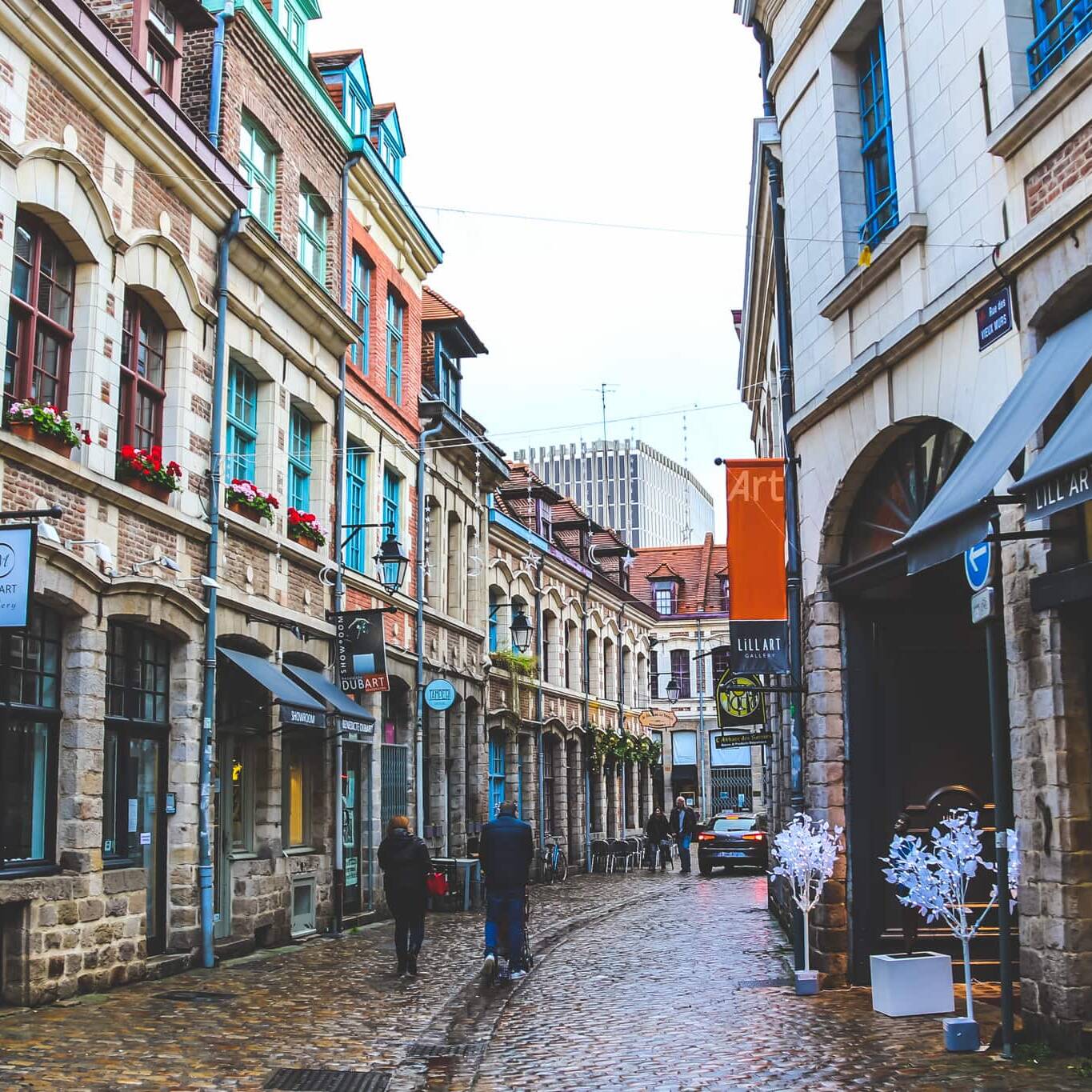 A damp and cobbled street in Vieux Lille