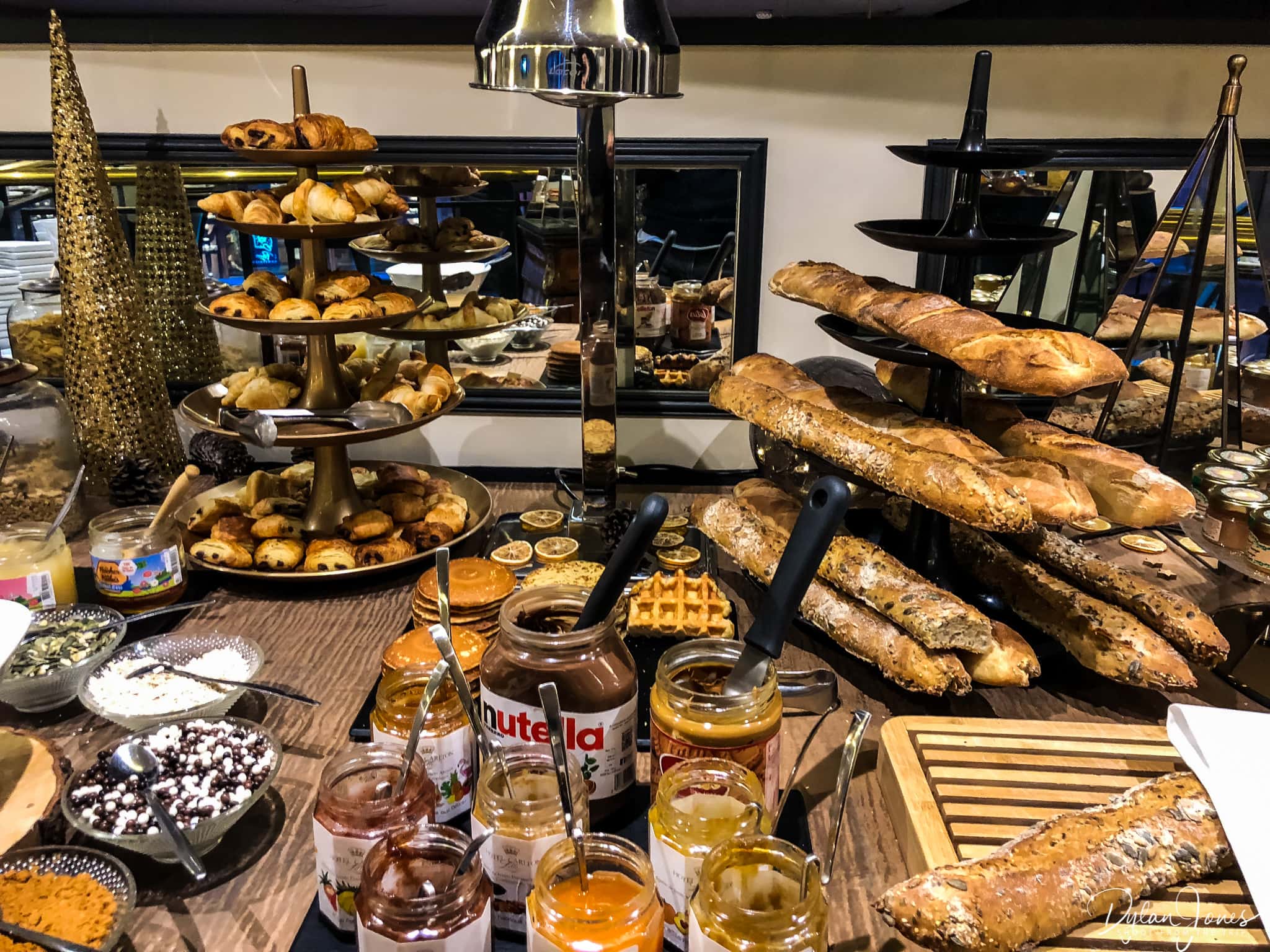 A selection of breads and pastries at the breakfast lounge, Hotel Carlton Lille
