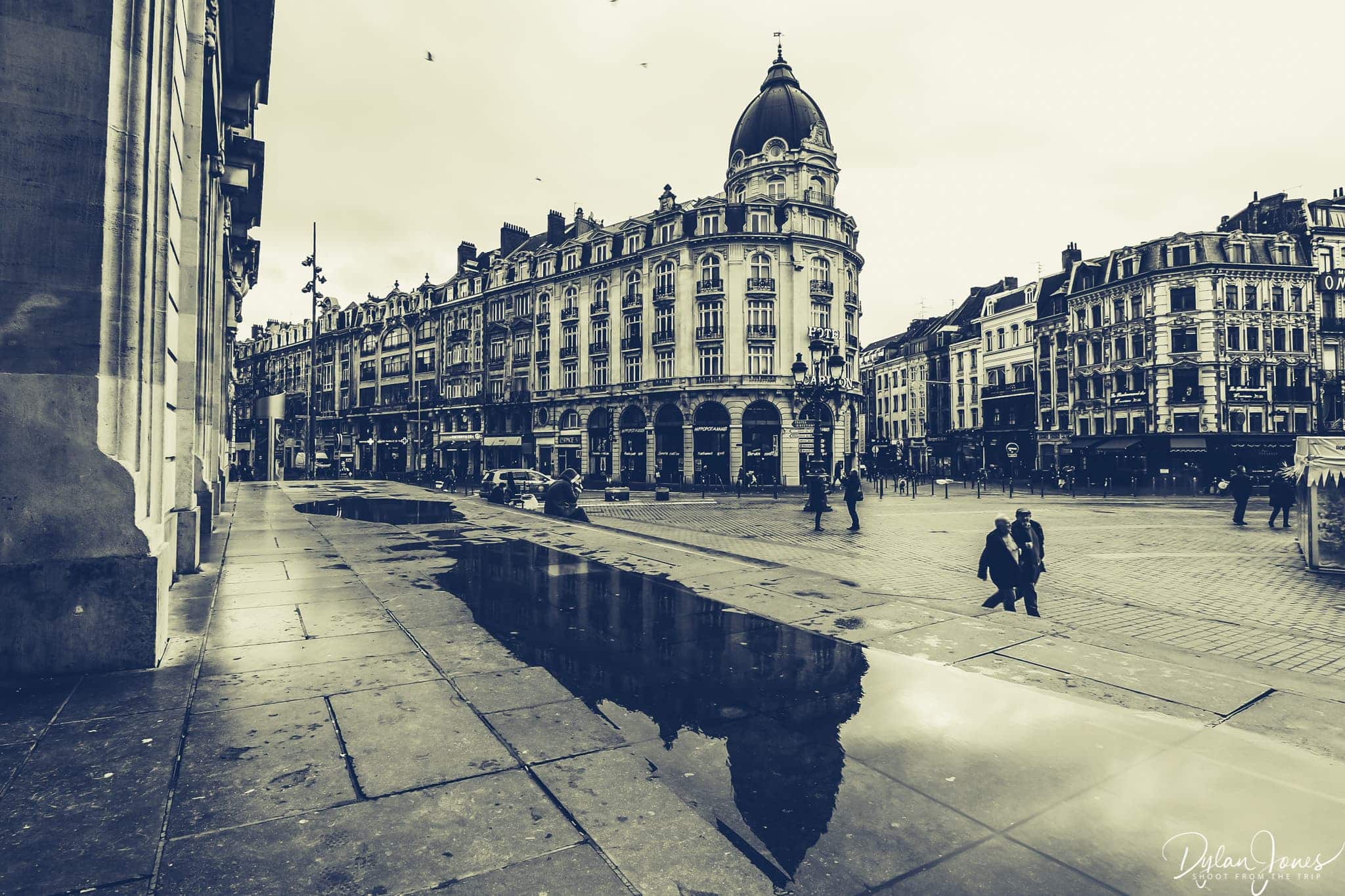 Reflection of Hotel Carlton Lille from the steps of the Opera