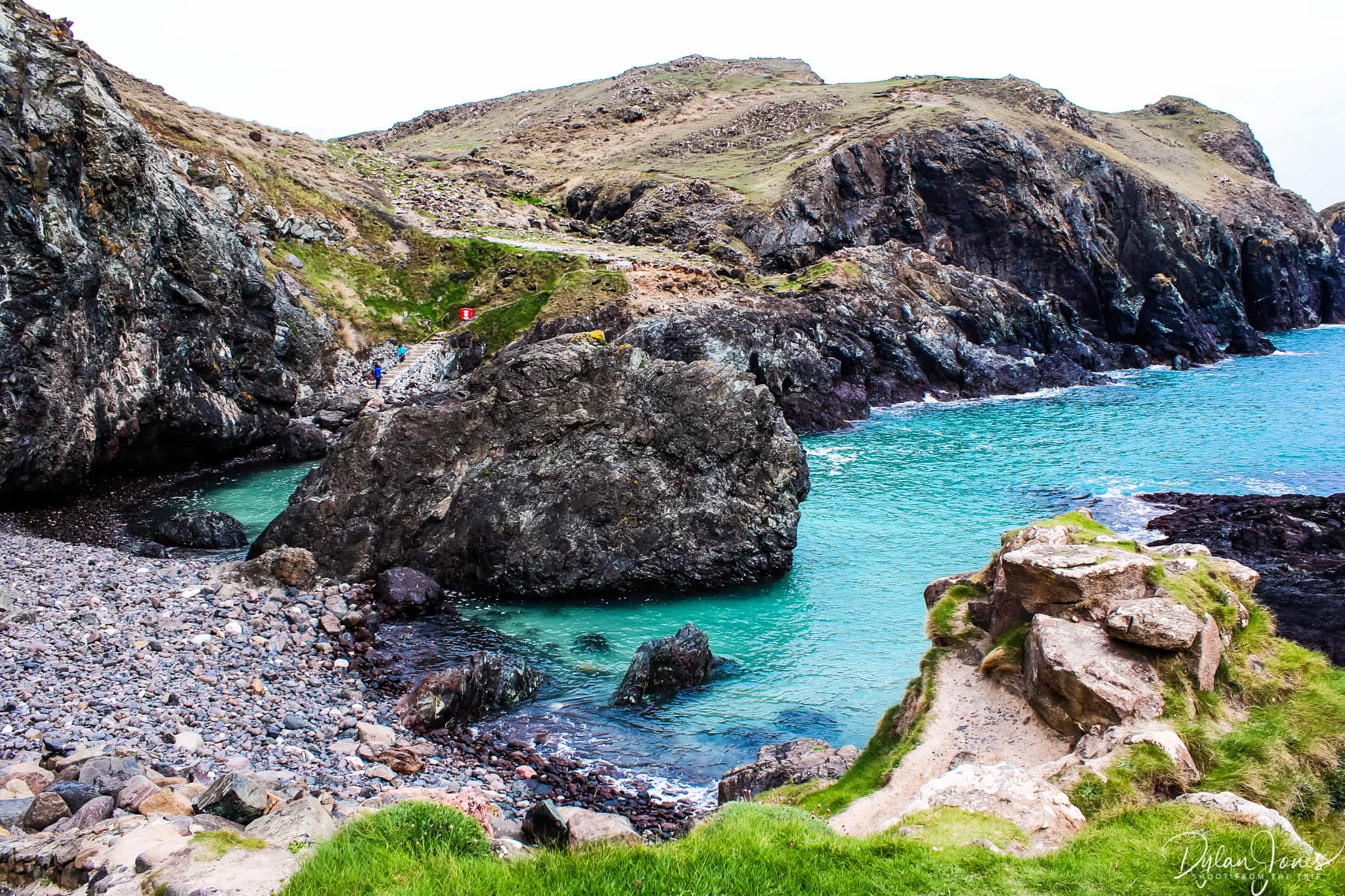 The clear waters of Kynance Cove at high tide, South Cornwall coast