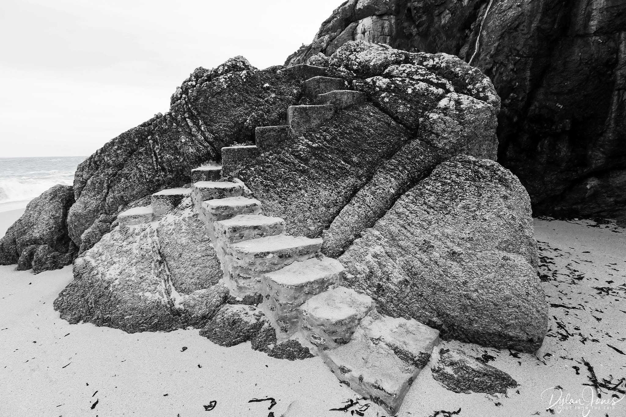 Steps to Porthcurno Beach built into the rocks, South Cornwall coast