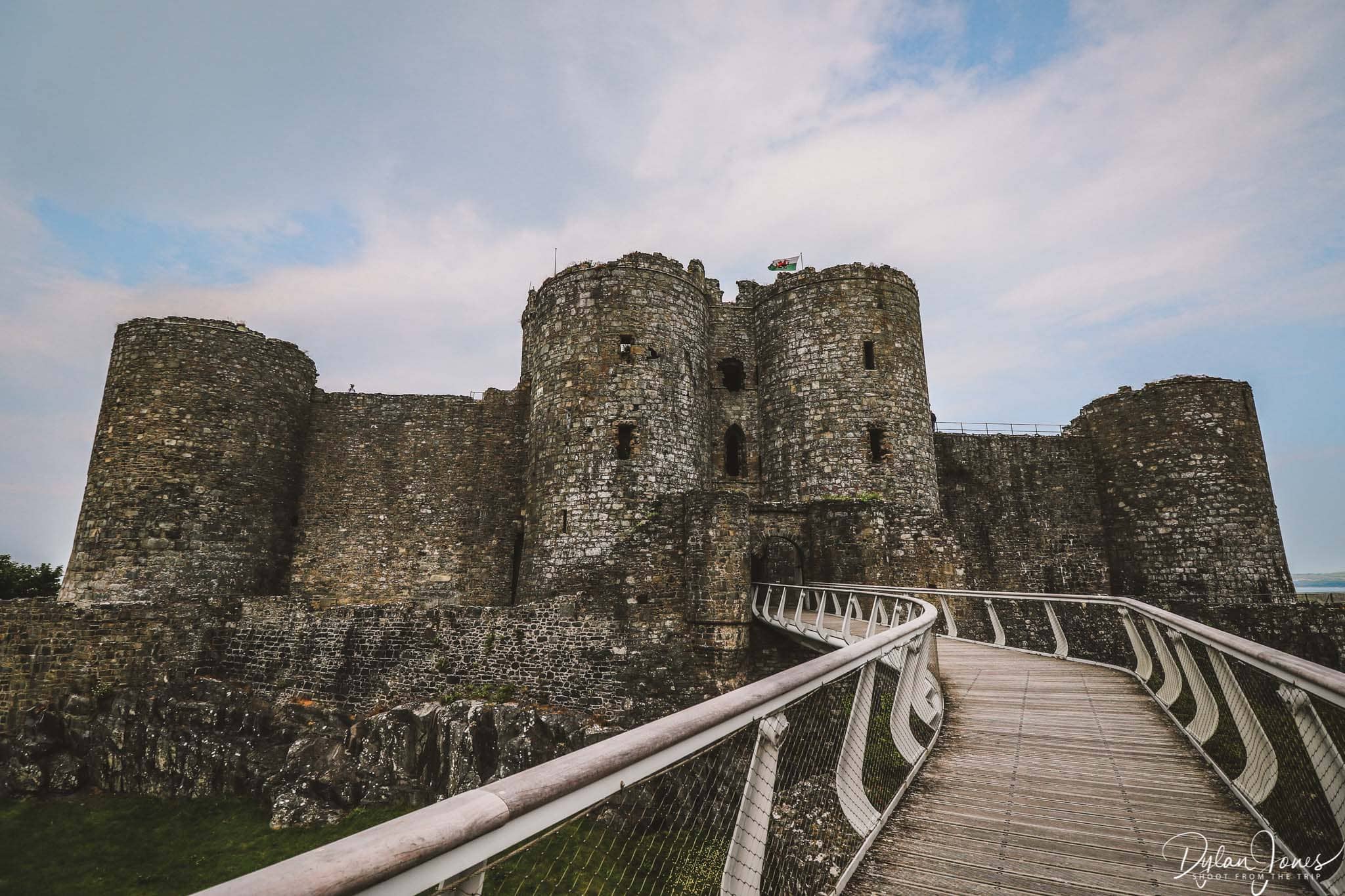 Crossing the footbridge to Harlech Castle