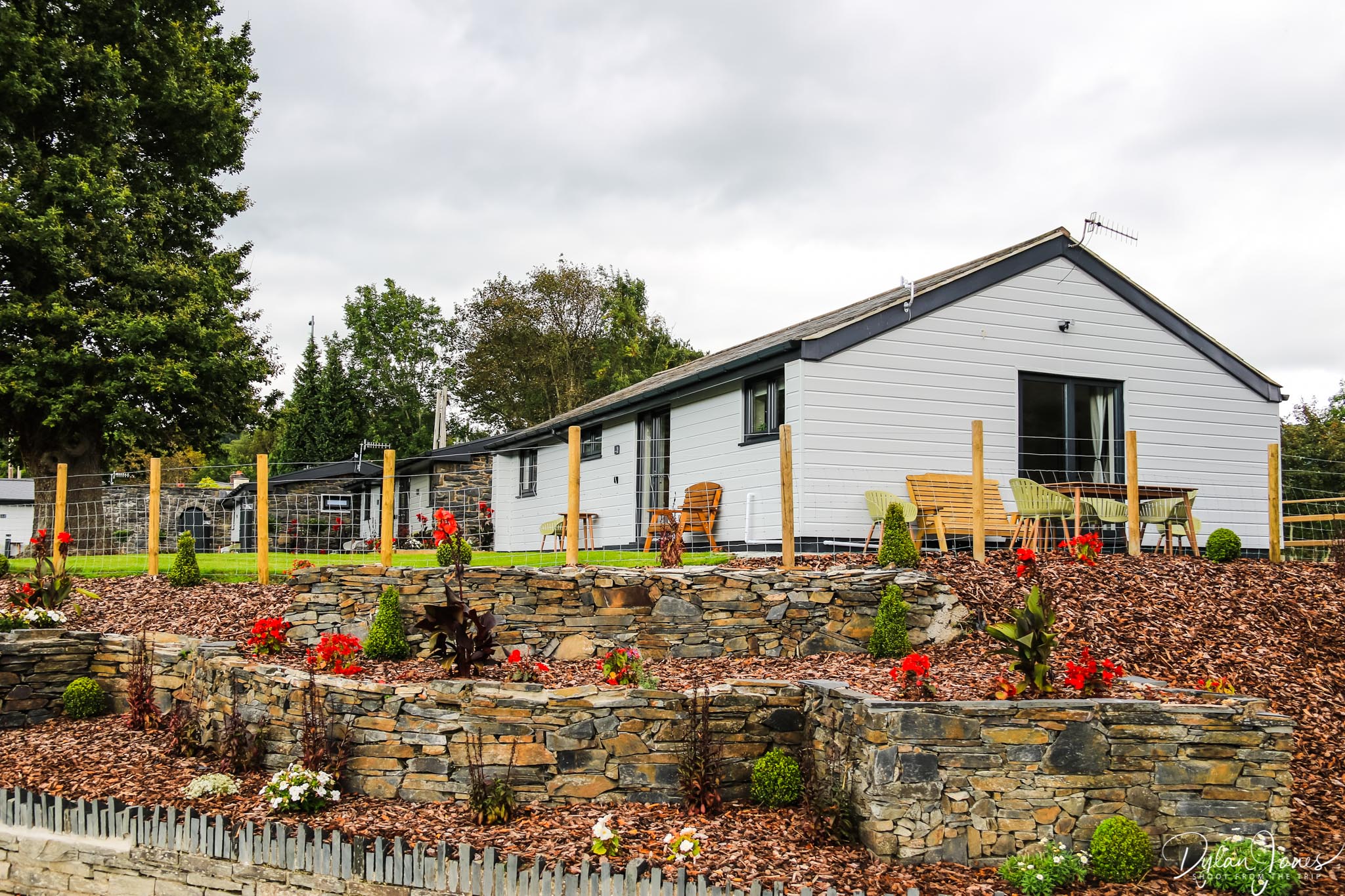 The landscaped grounds around Rwst Holiday Lodges