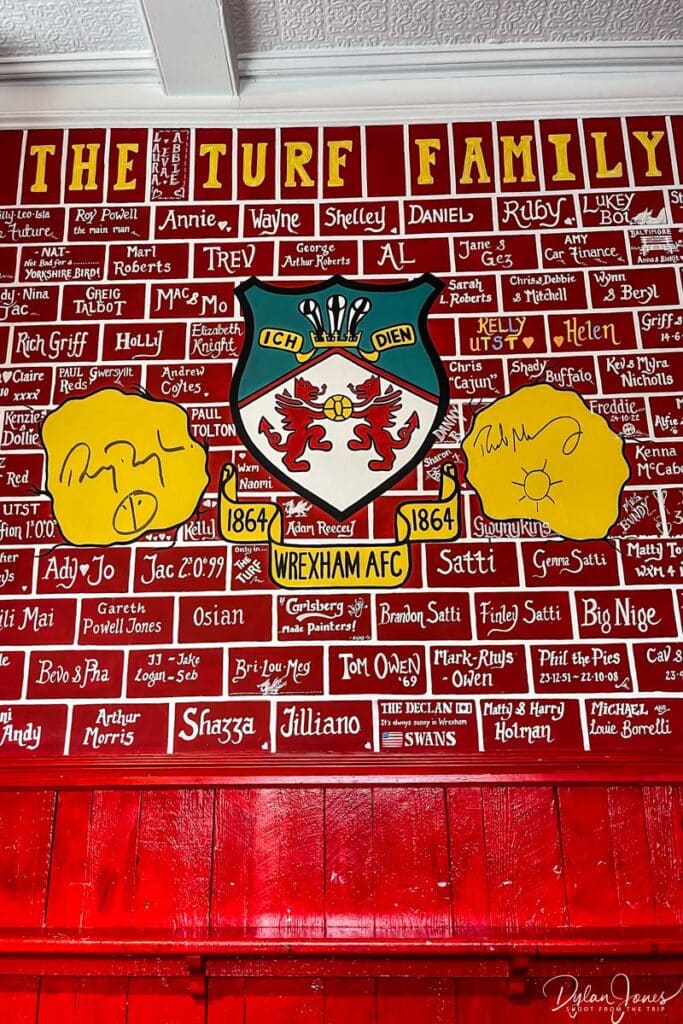 Signed wall at The Turf