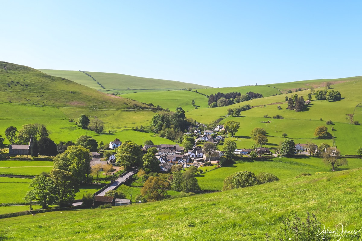 A view of Llanarmon Dyffryn Ceirog nestled in the valley