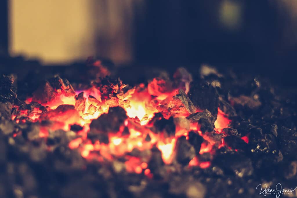 Glowing embers in the forge